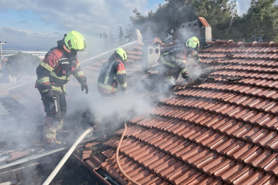 BURHANİYE’DE ÇATI YANGINI KORKUTTU
