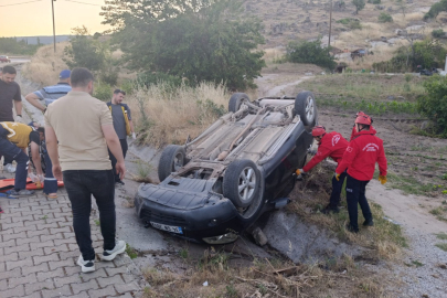 KONTROLDEN ÇIKAN OTOMOBİL TAKLA ATTI